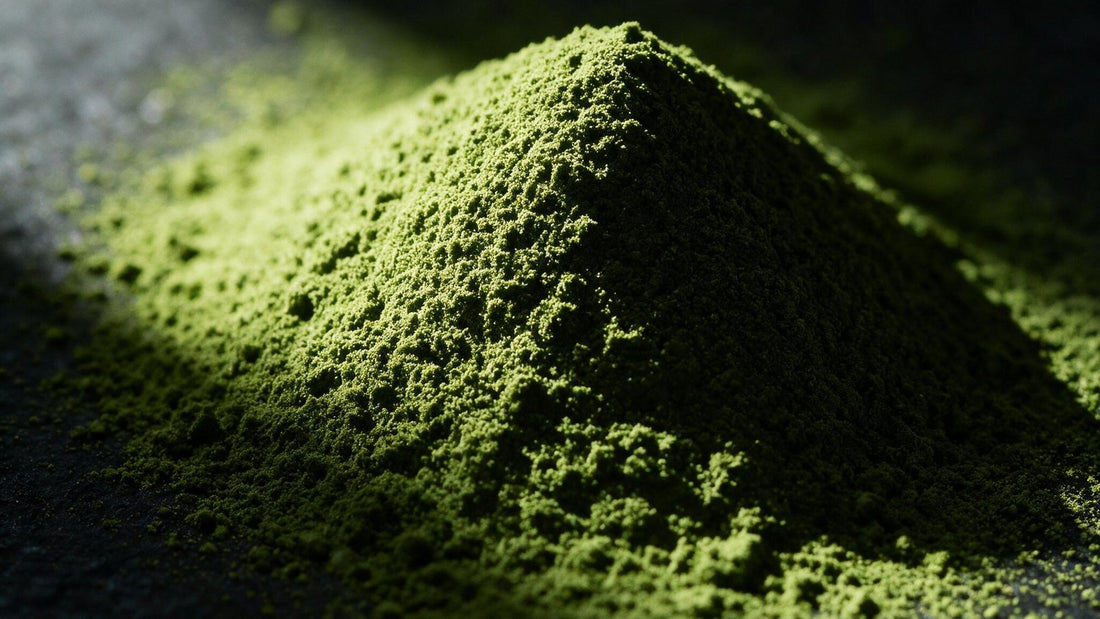 Macro view of bright green matcha powder, finely ground, lit from the side