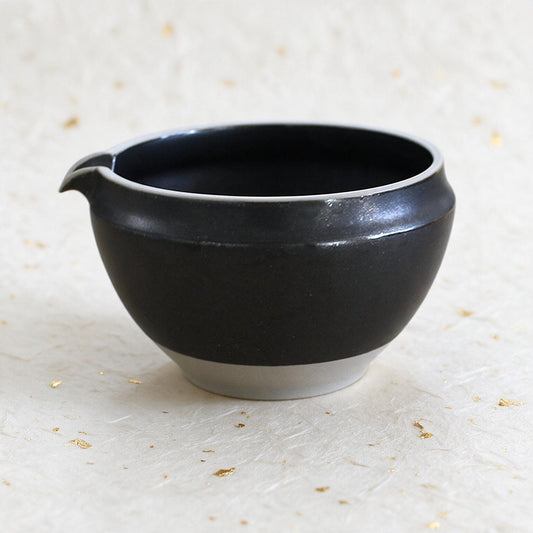 Mino-yaki chawan, a black Japanese matcha bowl with a pour spout