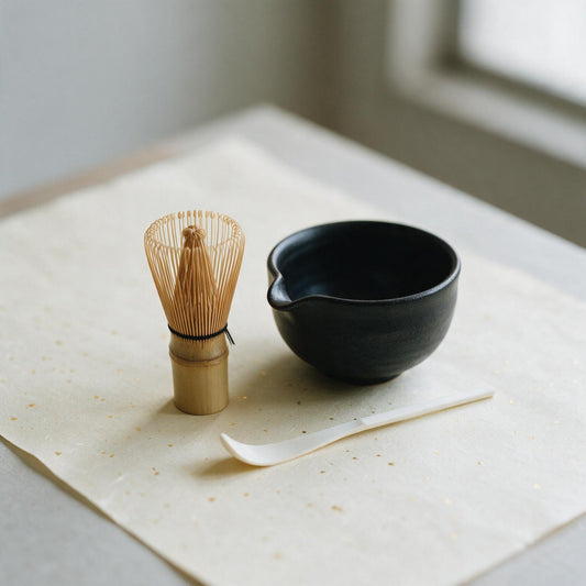 Matcha starter set: bamboo chasen whisk, black Mino-yaki bowl with pour spout, and white-bamboo scoop