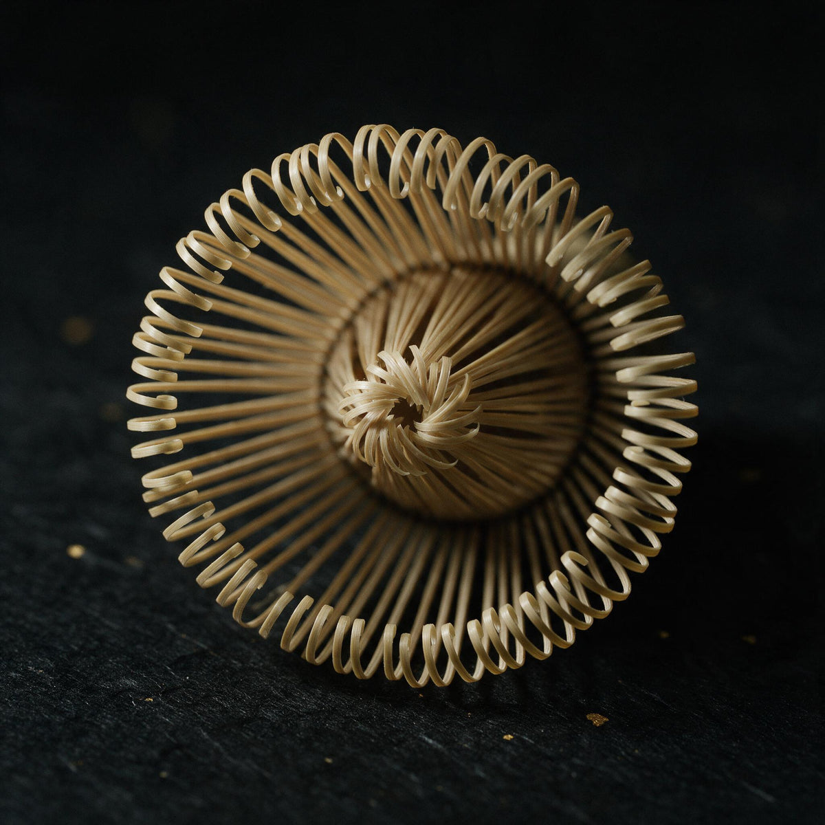 Takayama bamboo matcha whisk seen from directly above, the hundred prongs in a spiral