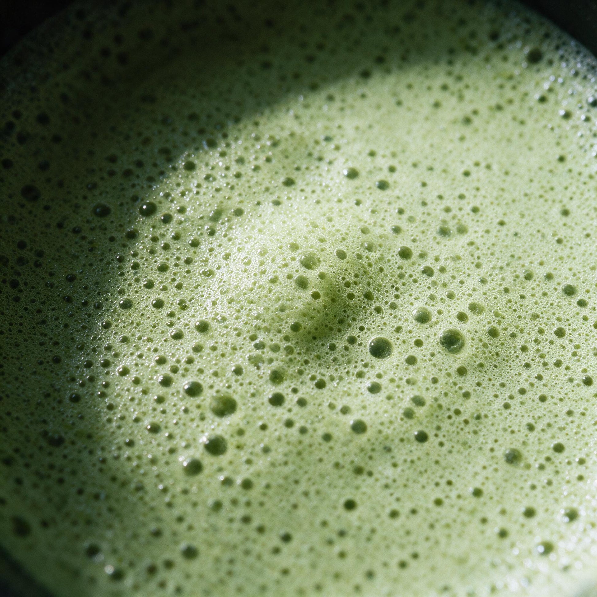 Whisked matcha foam, close up